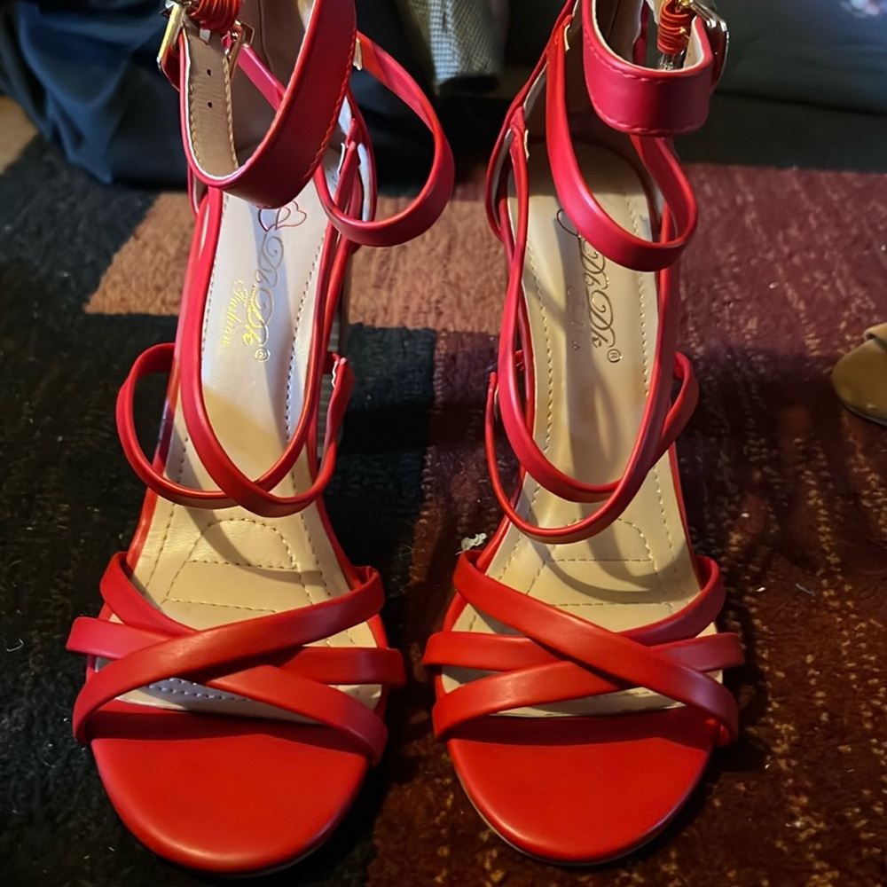 Red strappy heels